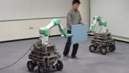 Handling of a Single Object by Multiple Mobile Robots based on Caster-Like Dynamics